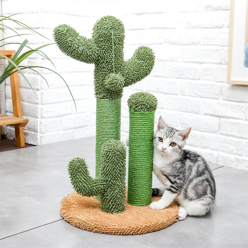 Cat sitting next to a green cactus-shaped cat scratcher on a light gray floor.