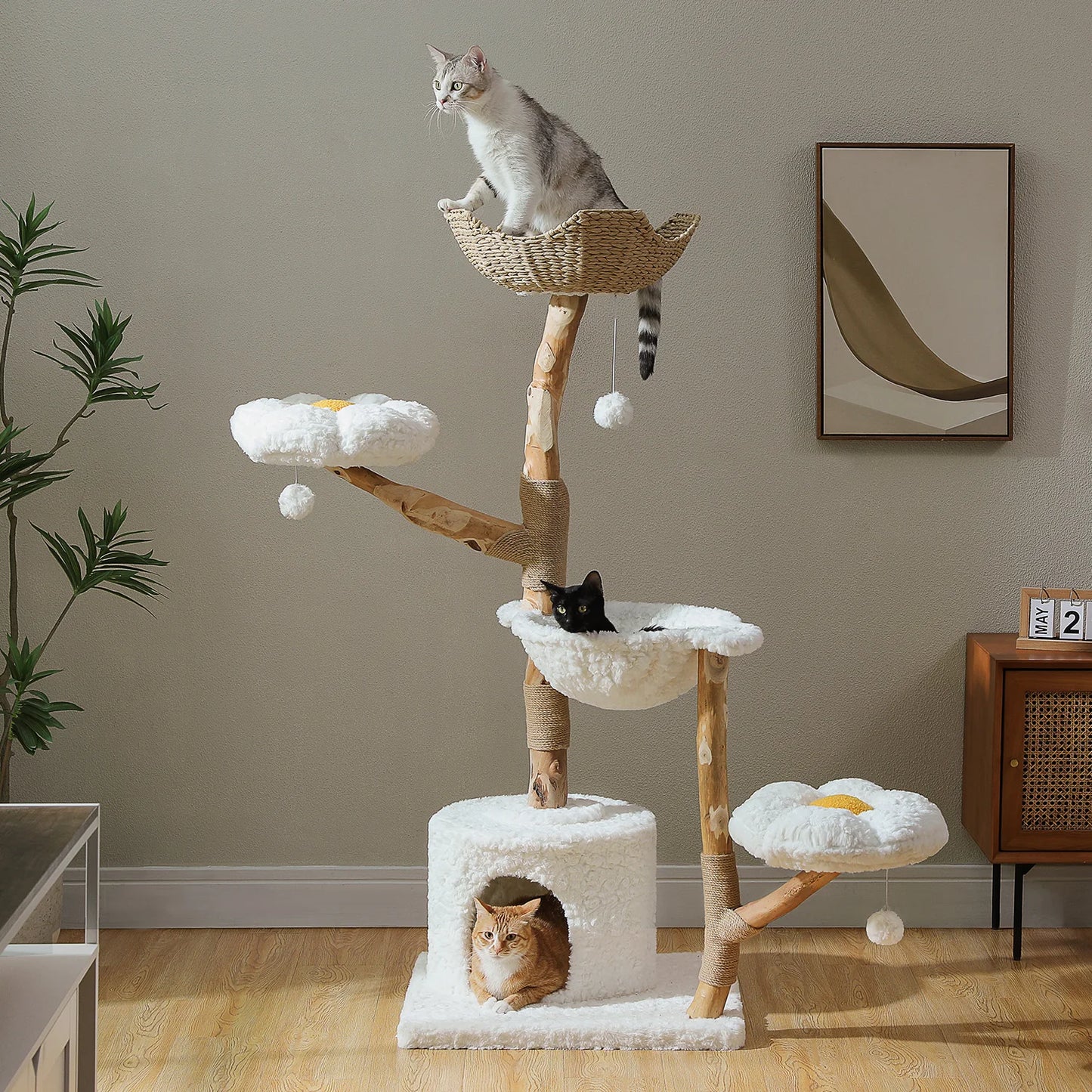 Cat tree with multiple levels and a cat sitting on each, in a room setting.