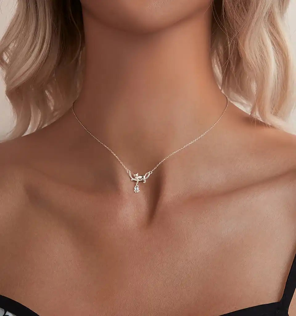 Necklace with a pendant on a model with a neutral background