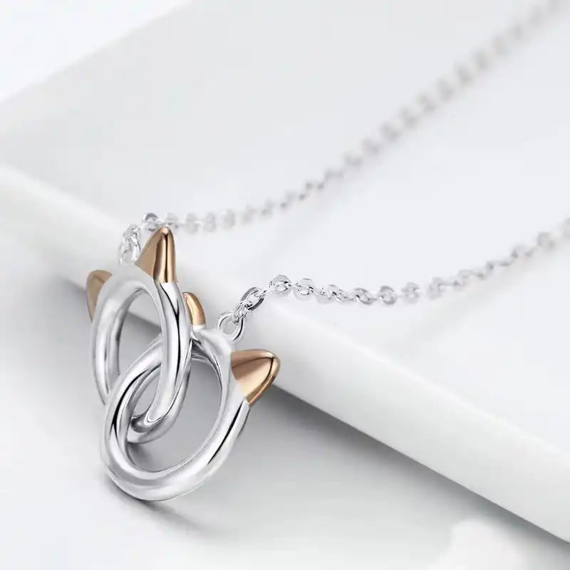 Necklace with interlocking rings on a white background