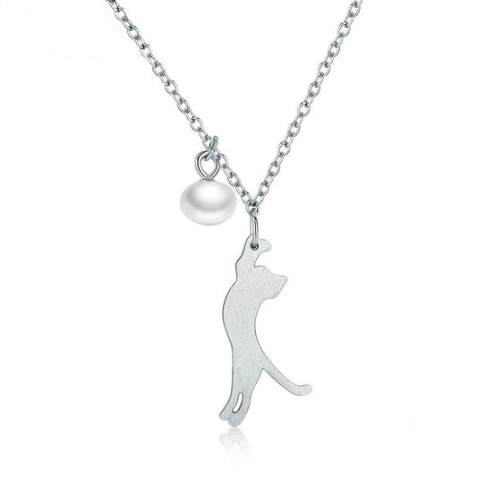 Silver necklace with a cat pendant and a pearl on a white background