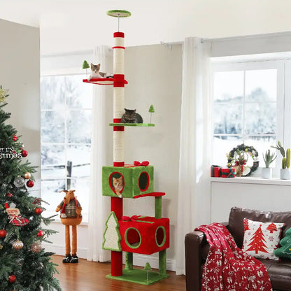 Cat tree with multiple levels in a living room decorated for Christmas.