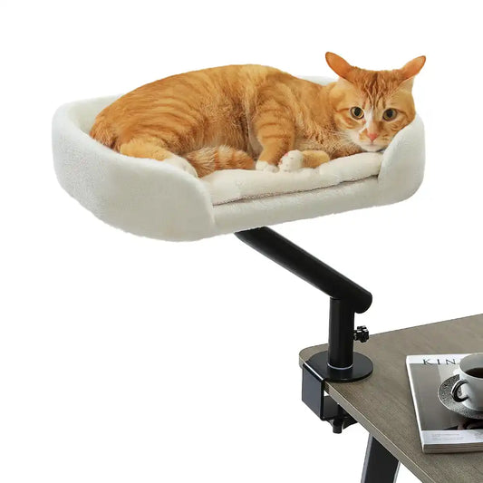 Cat lounging on a elevated pet bed attached to a table