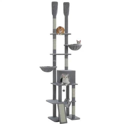 Gray cat tree with various perches and a small cat on a white background