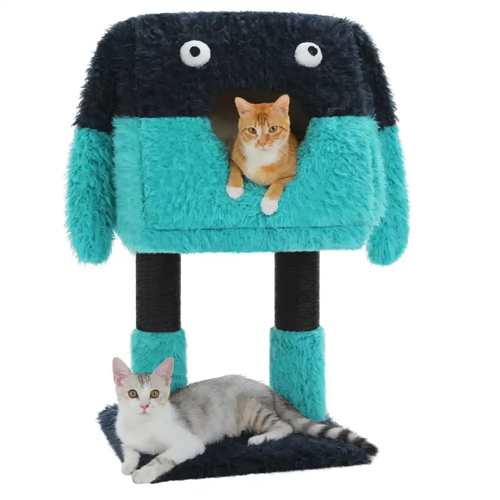 Monster-shaped cat bed with two cats on white background.