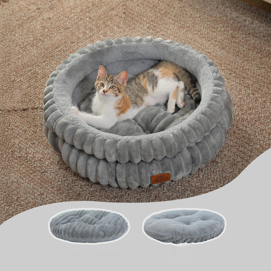 Cat lying in a gray pet bed on a carpeted floor with an inset showing textures of both sides of a pillow.