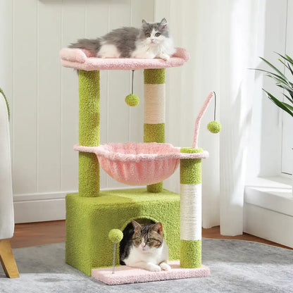 Cat tree with two cats on different levels in a room with a window and plant.