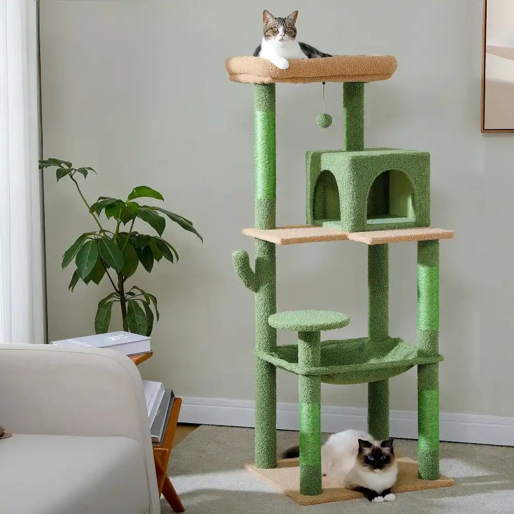Green cat tree with two cats in a living room setting