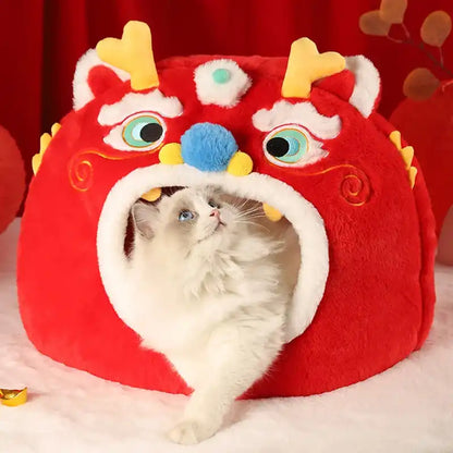 Cat inside a red dragon-shaped pet house with colorful accents on a red background.