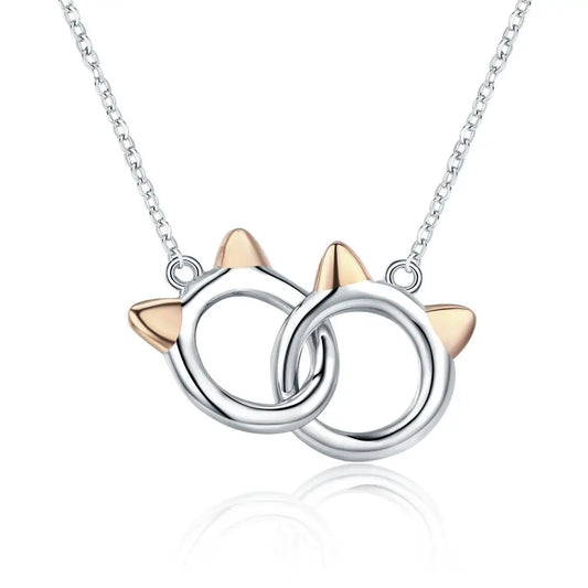 Necklace with cat ear pendants on a white background