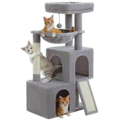 Gray cat tree with two condos and three cats playing on it