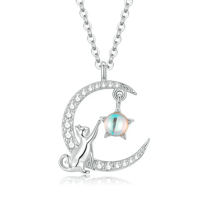 Silver necklace with a cat and moon pendant on a white background