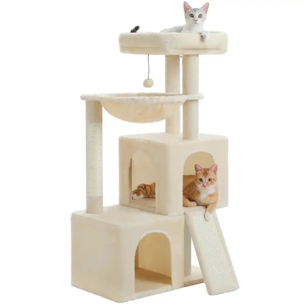 Two cats on a beige cat tree with two condos, a hammock and a perch