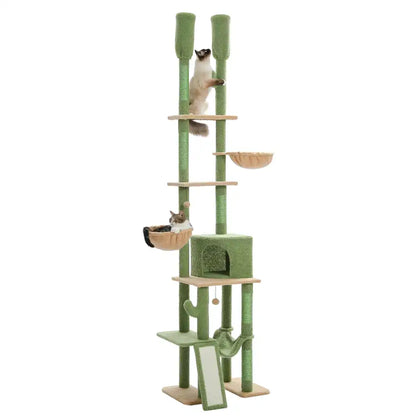 Green cat tree with multiple levels and a cat perched on one of the shelves.