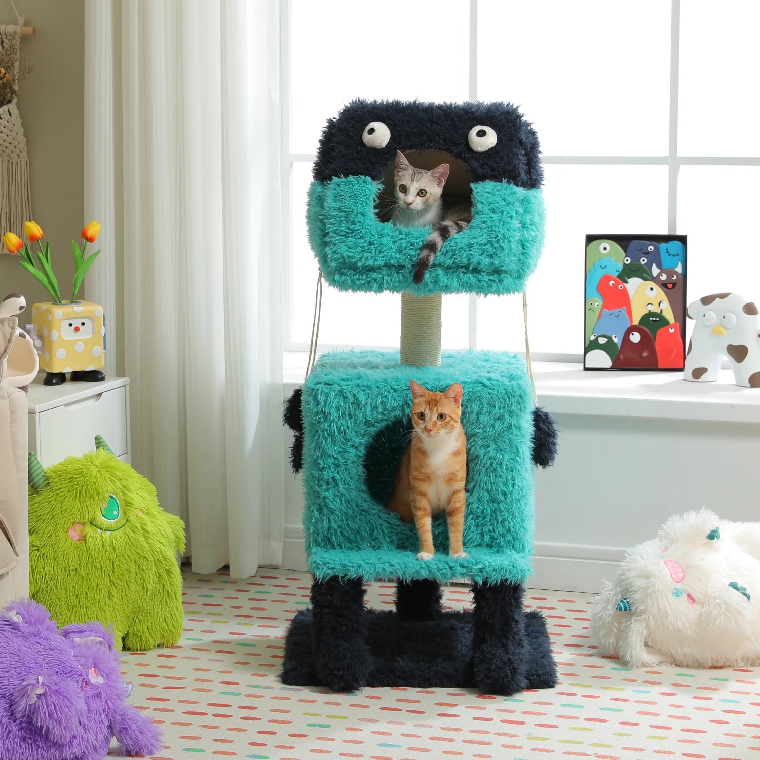 Colorful monster-shaped cat tree with two cats on a patterned rug in a room.